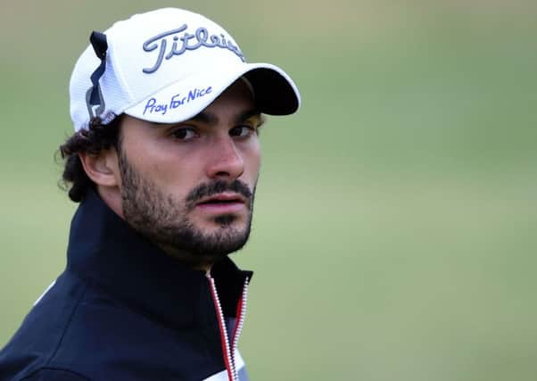 France's Clement Sordet wears a black ribbon on his cap with the slogan "Pray For Nice" written on the peak. Picture: Getty Images