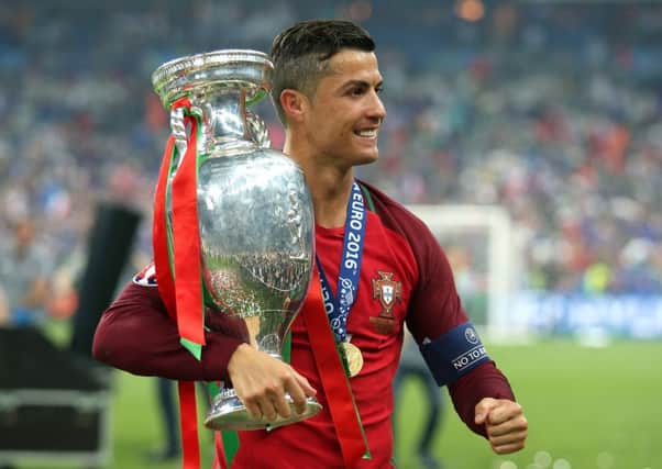 Cristiano Ronaldo celebrates after Portugal's Euro 2016 final victory over hosts France. Picture: Jean Catuffe/Getty Images