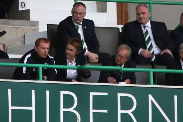 Neil Lennon sits next to Leeann Dempster after being sent off. Picture: PA