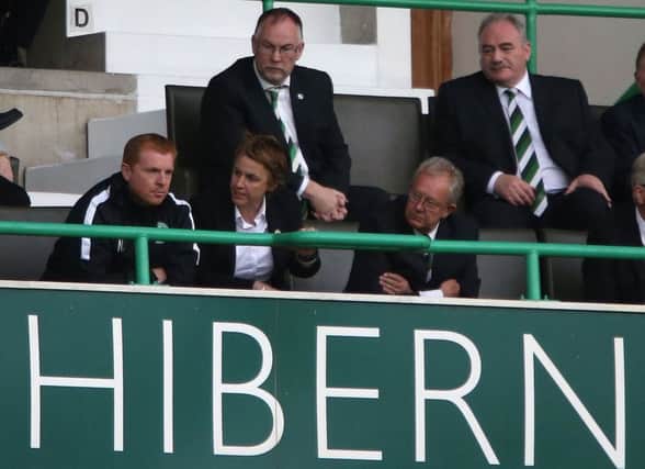 Neil Lennon sits next to Leeann Dempster after being sent off. Picture: PA