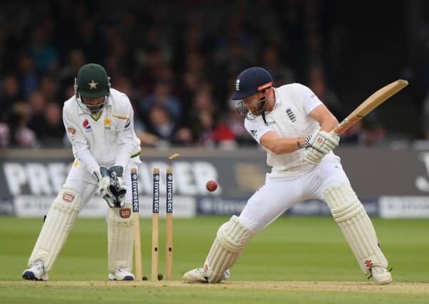 England batsman Jonny Bairstow is bowled for 29 runs during the first Test at Lords yesterday. Picture: Getty