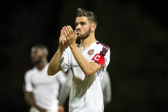 Alim Ozturk: Exhausted on his return to Edinburgh. Picture: SNS