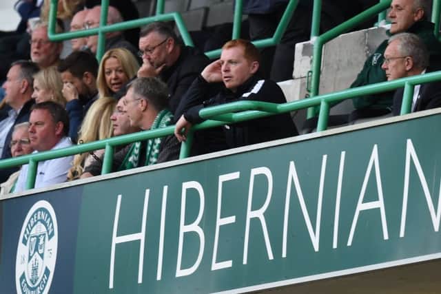 Manager Neil Lennon watches from the stand after being sent from the dugout on Thursday. Picture: SNS.