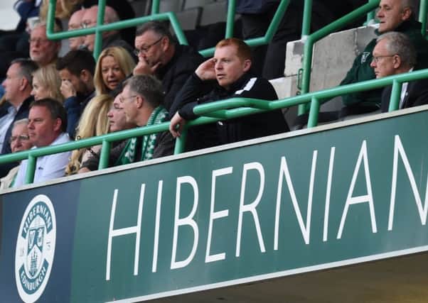 Manager Neil Lennon watches from the stand after being sent from the dugout on Thursday. Picture: SNS.