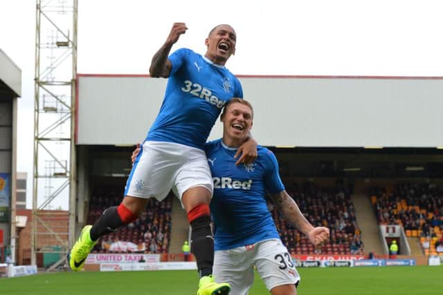 James Tavernier celebrates scoring the second goal against Motherwell with first goalscorer Martyn Waghorn. Picture: Mark Runnacles/Getty Images