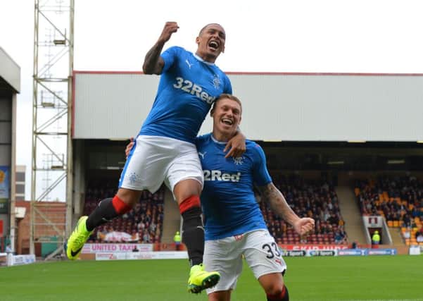 James Tavernier celebrates scoring the second goal against Motherwell with first goalscorer Martyn Waghorn. Picture: Mark Runnacles/Getty Images