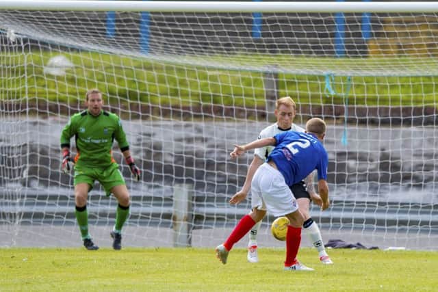 Dean Brett scores for Cowdenbeath, his 23rd minute effort put the sides level but Gary Warren won the match for Caley.  Photograph: Paul Devlin/SNS