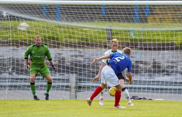 Dean Brett scores for Cowdenbeath, his 23rd minute effort put the sides level but Gary Warren won the match for Caley. Photograph: Paul Devlin/SNS