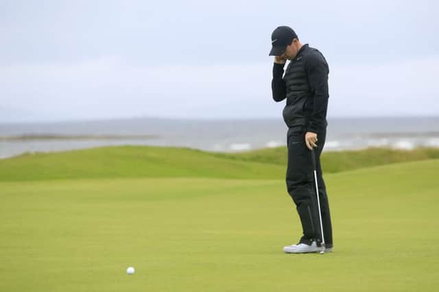 Northern Ireland's Rory McIlroy reacts after a missed putt on the fifth. Picture: Danny Lawson/PA