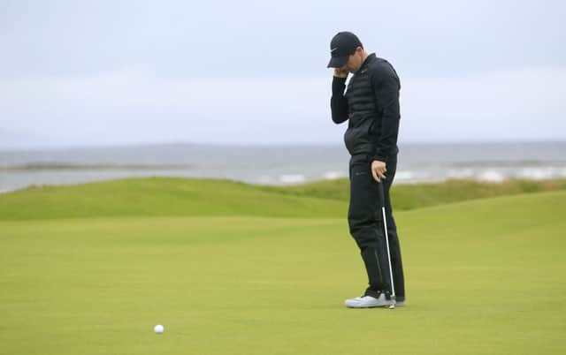 Northern Ireland's Rory McIlroy reacts after a missed putt on the fifth. Picture: Danny Lawson/PA