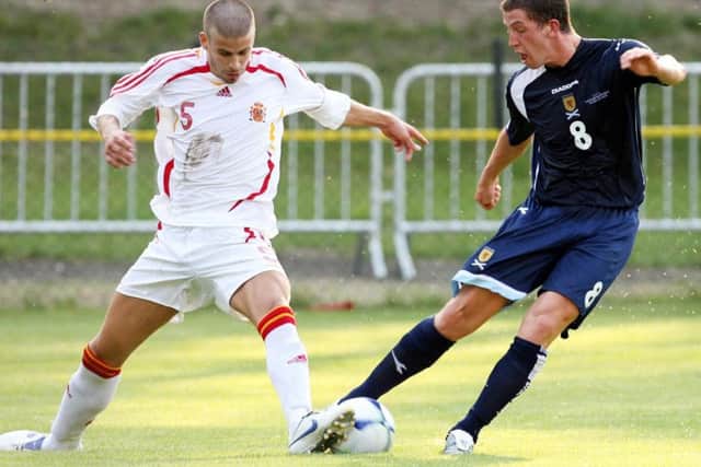 Spain's Gerard Pique challenges Scotland's Calum Elliot during the 2006 U19 Euros. Picture: SNS