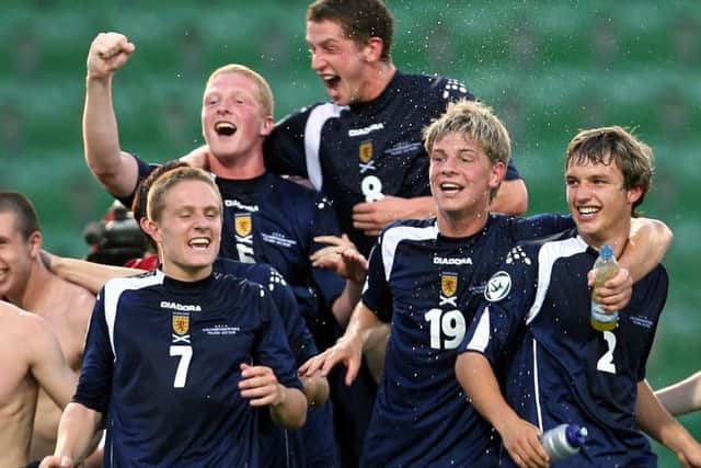 Calum Elliot (No.8) leads the celebrations as Scotland beat Czech Republic to reach the 2006 U19 Euro final. Picture: SNS