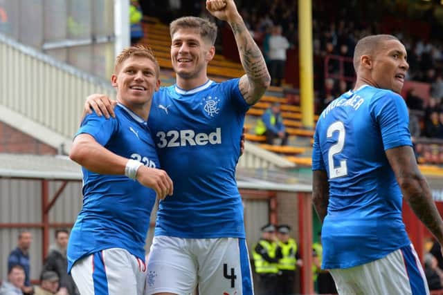 Martyn Waghorn of Rangers celebrates scoring a goal late in the second half with Rob Kiernan against Motherwell. Picture: Getty Images