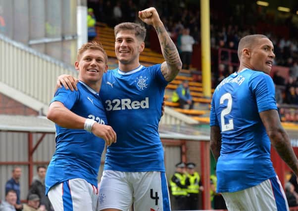 Martyn Waghorn of Rangers celebrates scoring a goal late in the second half with Rob Kiernan  against Motherwell. Picture: Getty Images