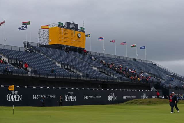 Mostly empty stands, few spectators following and a dreich day  the way Colin Montgomerie said goodbye to an Open career. Picture: PA