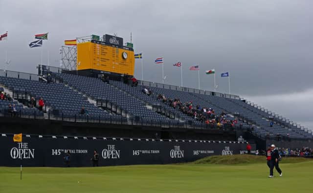 Mostly empty stands, few spectators following and a dreich day  the way Colin Montgomerie said goodbye to an Open career. Picture: PA