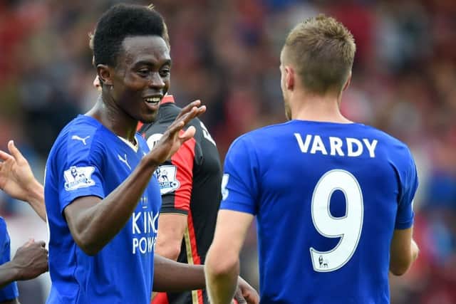 Dodoo with Jamie Vardy after the former's English Premier League debut against Bournemouth. Picture: Getty