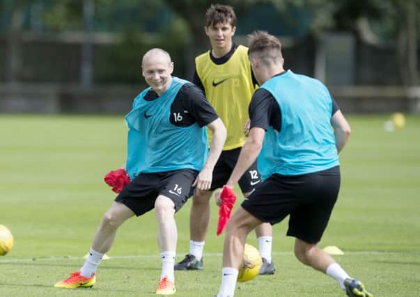 Willo Flood trains with his new Dundee United team-mates yesterday ahead of their Betfred Cup clash with Cowdenbeath. Picture: SNS