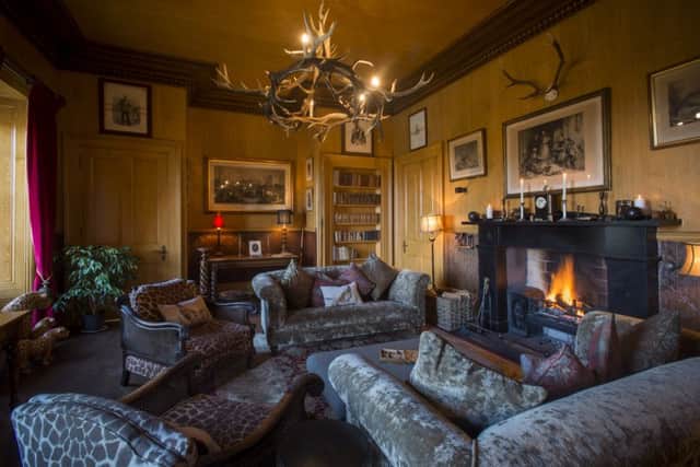 The main drawing room of Glentruim House with its original open fireplace harks back to the decor of the Victorian hunting lodge.