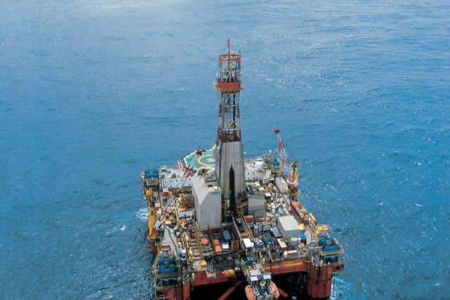 Shell reports lower profits