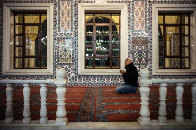 A Muslim worshipper prays at a Johannesburg mosque on 7 June, the first day of Ramadan, last month. Western hostility to Islamic faith belies the extent to which we embraced the thought of its followers. Picture: Marco Longari/Getty