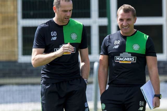 Celtic manager Brendan Rodgers, right, is concerned over his defensive options. Picture: SNS.