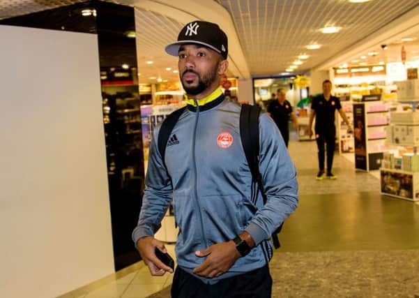 The squad, including right back Shay Logan, have been delayed at Aberdeen airport. Picture: SNS