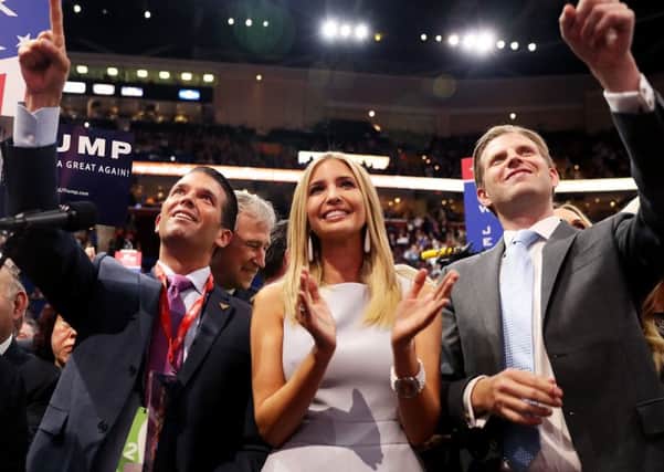 Donald Jr, left, Ivanka and Eric Trump take part in the roll call that formally declared their father the  Republican presidential candidate . Picture: Getty Images