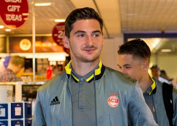 Kenny McLean at Aberdeen airport en route to Latvia where the Dons face Ventspils in today's second leg. Picture: SNS Group