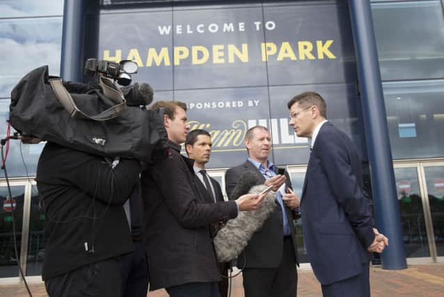 SPFL chief executive Neil Doncaster speaks to the media outside Hampden Park after yesterdays annual general meeting. Picture: SNS