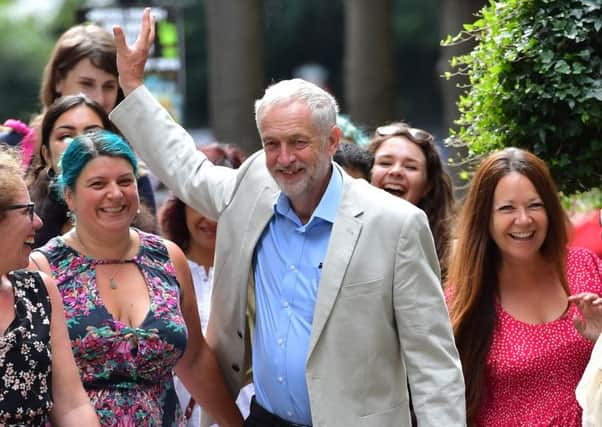 Labour leader, Jeremy Corbyn, is surrounded by supporters as he arrives to launch his leadership campaign at a press conference in London. Picture: Getty