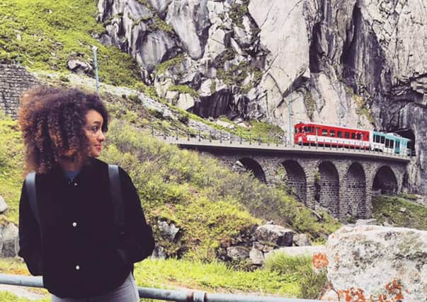 Danya Bazaraa watches the train exit the tunnel at Andermatt. Picture: PA