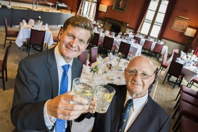 Bank of Scotland relationship manager Derek Weir, left, toasts the revamp with Royal Burgess treasurer Jim Rigby. Picture: Chris Watt