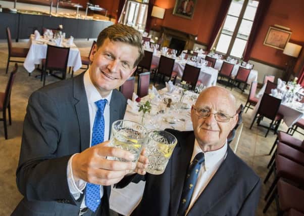 Bank of Scotland relationship manager Derek Weir, left, toasts the revamp with Royal Burgess treasurer Jim Rigby. Picture: Chris Watt