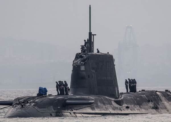 The nuclear submarine HMS Ambush making an unscheduled stop in Gibraltar due to damage to its conning tower after hitting a vessel. AFP/DM Parody/Getty Images