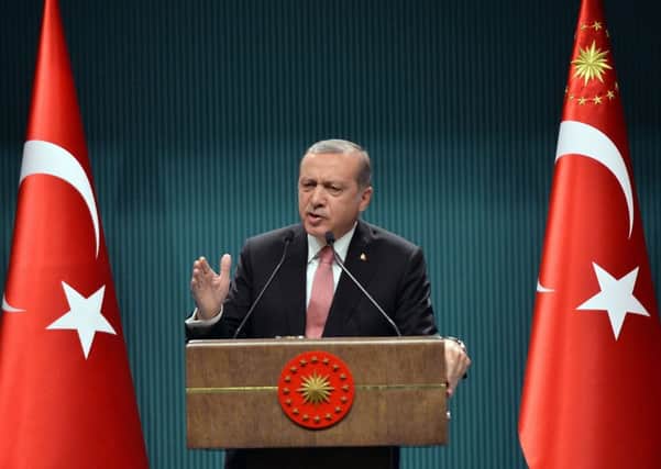 President Erdogan announces plans to purge the  military. Picture: AP