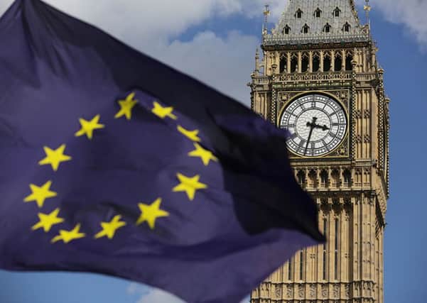 A European Union flag in front of the Palace of Westminster. Picture: Daniel Leal-Olivas/PA Wire