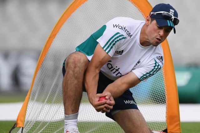 England captain Alastair Cook during catching practice at ahead of the 2nd Test against Pakistan at Old Trafford. Picture: Stu Forster/Getty