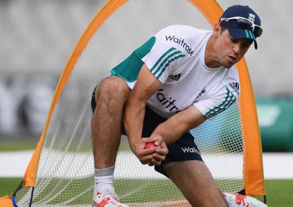 England captain Alastair Cook during catching practice at ahead of the 2nd Test against Pakistan at Old Trafford. Picture: Stu Forster/Getty
