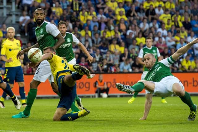 David Gray puts Hibs ahead. Pic: SNS