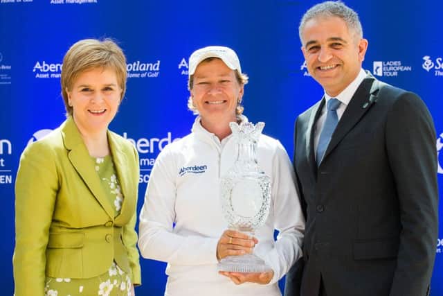 Catriona Matthew celebrates her appointment as a vice captain for the 2017 Solheim Cup with First Minister Nicola Sturgeon and LET chief executive Ivan Khodabakhsh