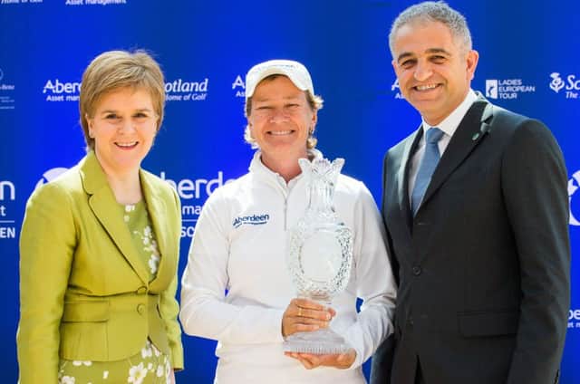 Catriona Matthew celebrates her appointment as a vice captain for the 2017 Solheim Cup with First Minister Nicola Sturgeon and LET chief executive Ivan Khodabakhsh