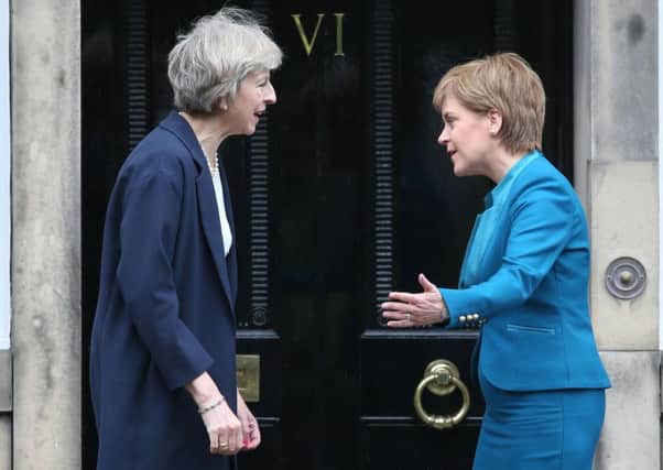Theresa May and Nicola Sturgeon at Bute House. Picture: PA