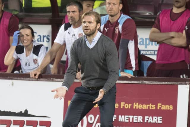 Robbie Neilson looks on in frustration during last night's game. Picture: Getty