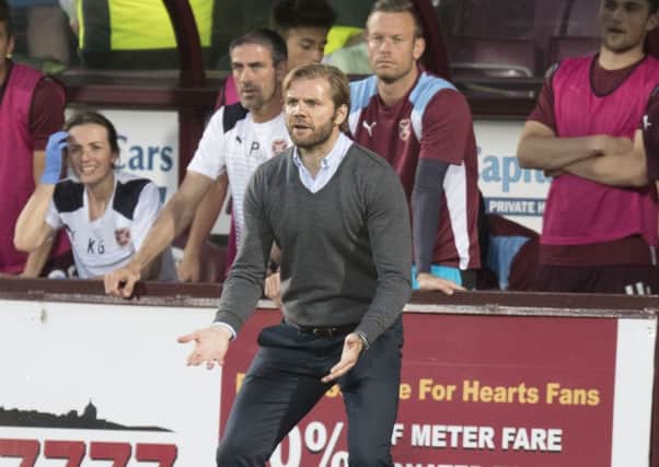 Robbie Neilson looks on in frustration during last night's game. Picture: Getty