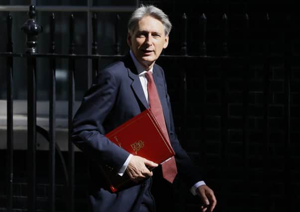 Philip Hammonds Autumn Statement will respond to economic indicators. Picture: Kirsty Wigglesworth/AP