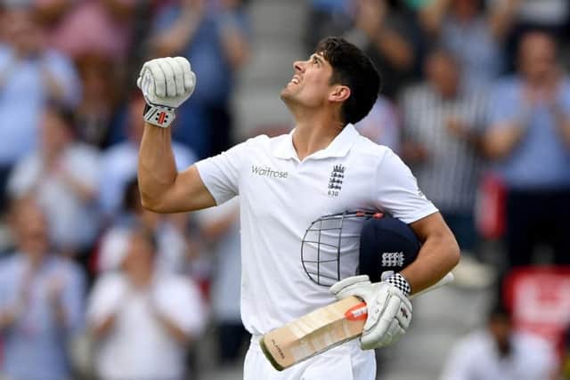 England captain Alastair Cook looks to the sky as he celebrates his century against Pakistan. Picture: Getty