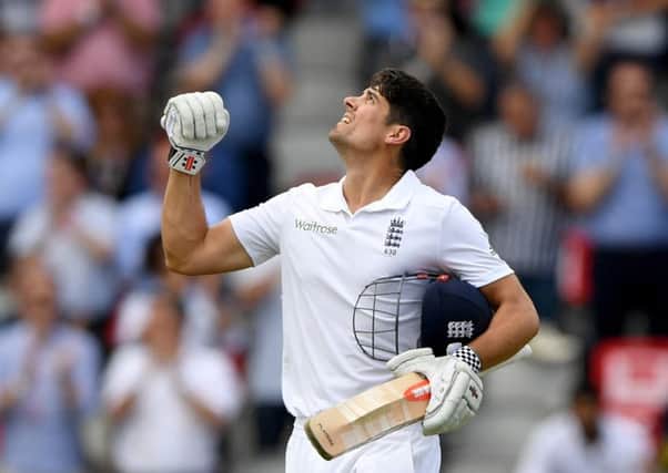England captain Alastair Cook looks to the sky as he celebrates his century against Pakistan. Picture: Getty