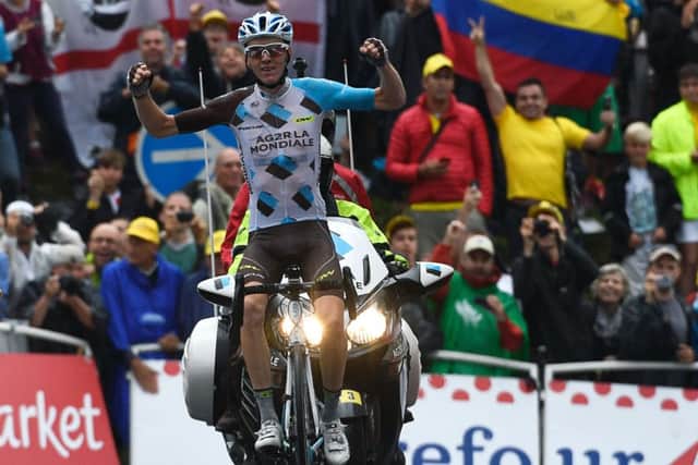 Romain Bardet celebrates as he crosses the finish line at the end of yesterdays 19th stage. Picture: AFP/Getty