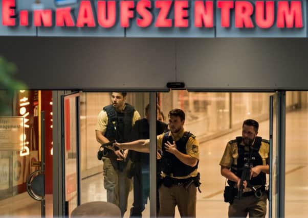 Police officers respond to a shooting at the Olympia Einkaufzentrum (OEZ). Picture: Getty